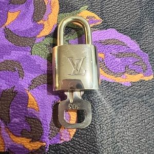 # 303 Louis Vuitton Lock and Key